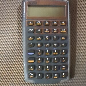 Casio Calculator with Orange Highlights
